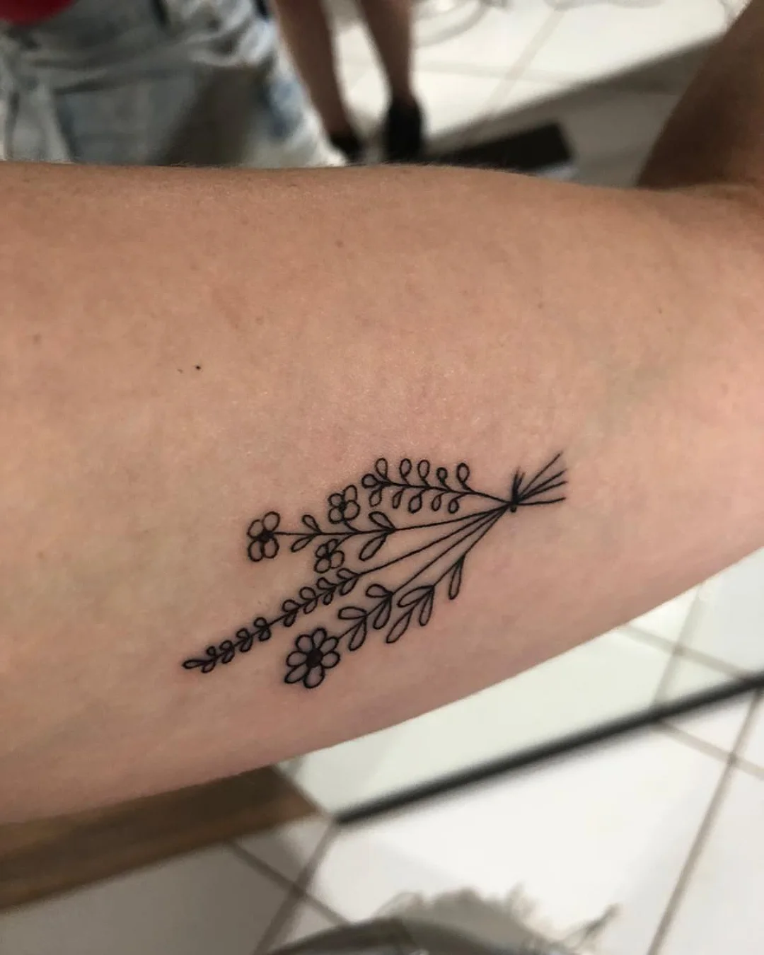 Tattoo botânico delicada 3