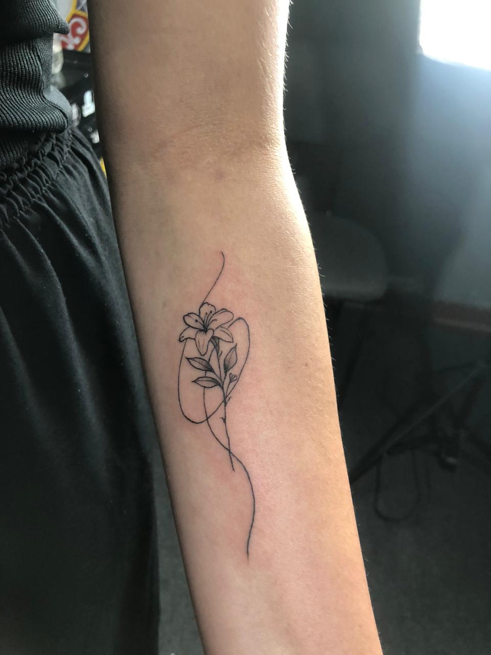 Tattoo botânico delicada 3